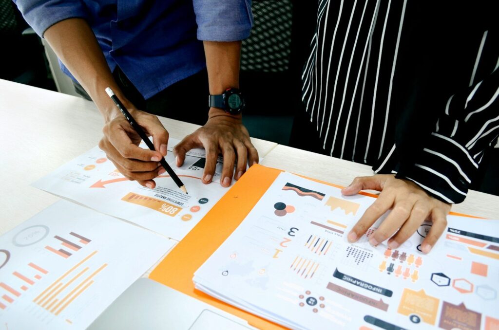 A focused person analyzing data to find the root cause of a business problem_Dennis Yukot
